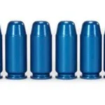 Pachmayr/Tacstar Division A-Zoom .40 S&W blue aluminum snap caps, ten upright in a row