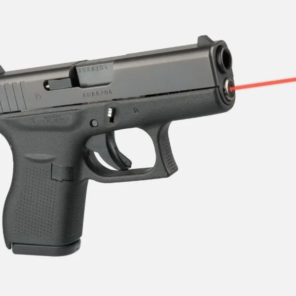 LaserMax Guide Rod Laser for Glock 42, installed in black handgun with red laser beam visible