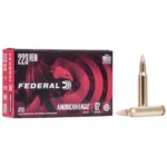 Federal FED AM EAGLE, red ammunition box with two brass cartridges beside it
