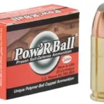 CORBON POW'RBALL ammunition, red and black box beside one brass cartridge
