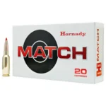 Hornady Match Rifle Ammunition, white Match box beside one brass cartridge with red-tipped bullet
