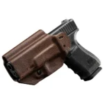 Mission First Tactical Leather Hybrid Holster, brown, angled view holding a black pistol
