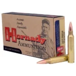 Hornady Match rifle ammunition, tan box with three brass cartridges and copper-coloured tips