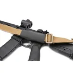 Blue Force Gear MultiCam sling sleeve, tan and grey, fitted over a rifle sling