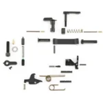 Ruger RUG AR LPK No FCG or Grip, assorted black and brass lower parts laid out