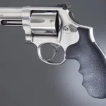 Hogue S&W K/L Round Butt black textured finger-groove grip installed on a stainless revolver