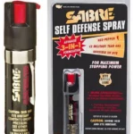 Security Equipment Corporation Sabre Pocket Spray With Clip, black canister beside retail package