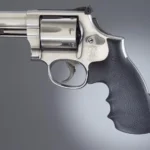 Hogue S&W K/L Convertion Kit, black finger-groove rubber grip shown on a silver revolver