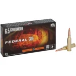 Federal Fusion Tipped Rifle Ammunition box with three brass cartridges, one standing upright