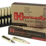 Hornady Varmint Express rifle ammunition, cartridges in tray beside two boxes and loose rounds