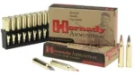 Hornady Varmint Express rifle ammunition, cartridges in tray beside two boxes and loose rounds