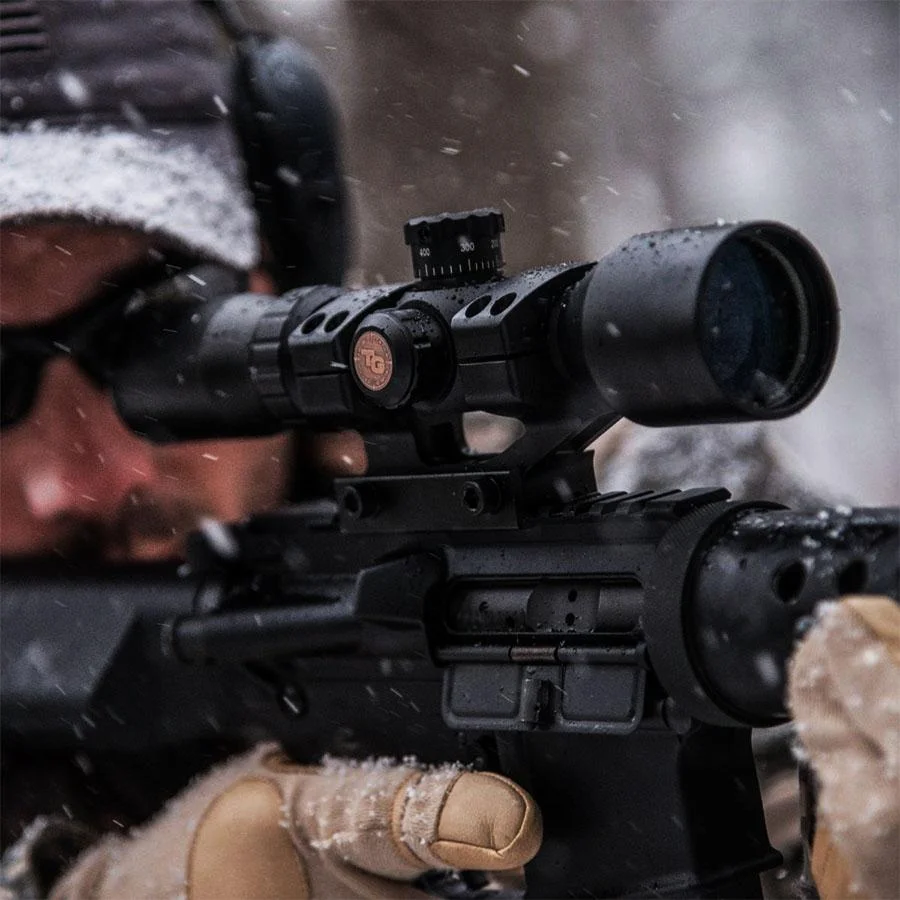 primary-54237 Truglo Tru-Brite 30 Series Tactical Rifle Scope, black side view mounted on a rifle