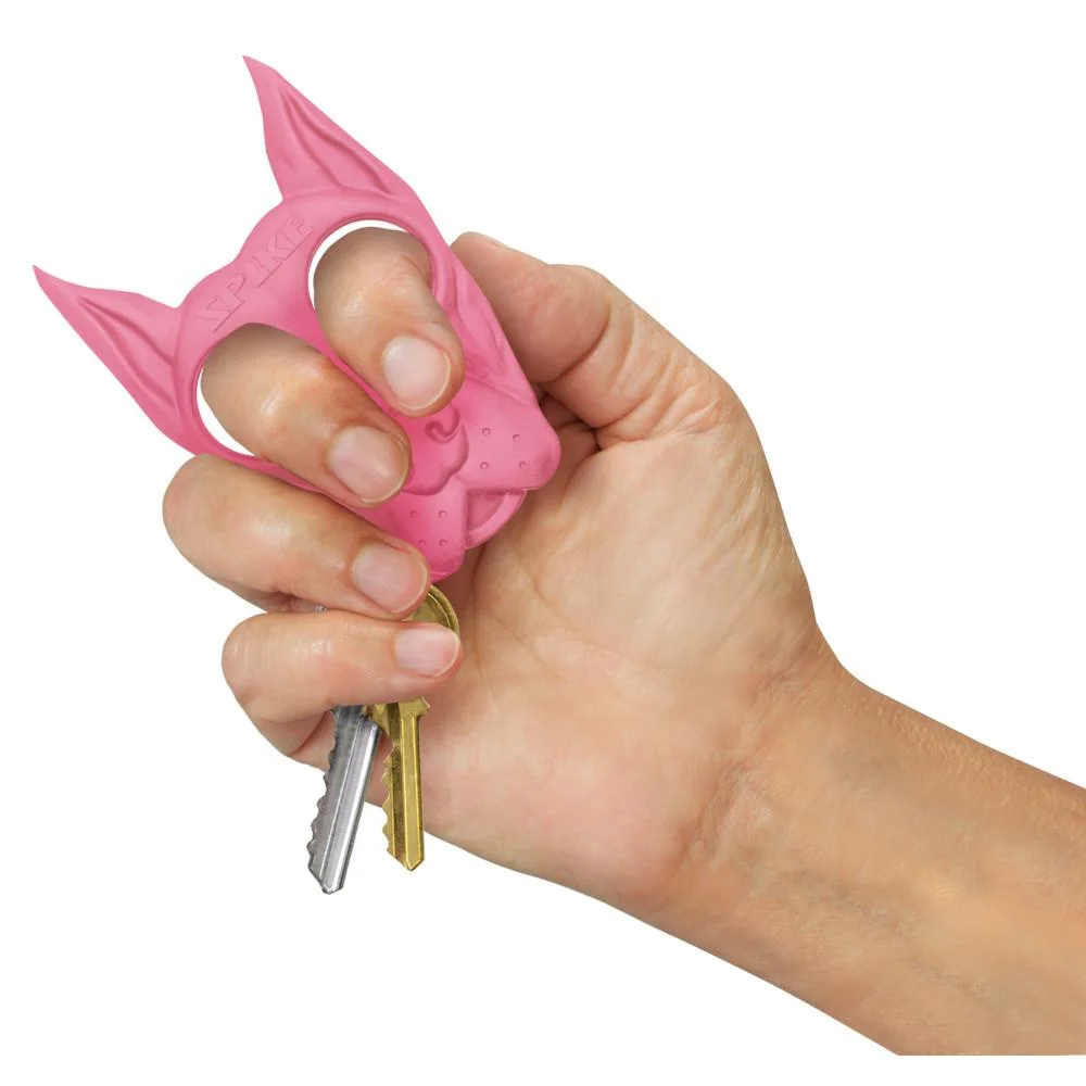 primary-54490 PS Products PS SPIKE SELF DEFENSE KEY CHAIN PINK pink spiked keychain held in a hand with keys