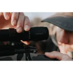 Leupold VX-5HD Gen 2 Rifle Scope black scope mounted on a rifle, shooter adjusting eyepiece