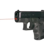 LaserMax Internal Laser Sight for Glock 26/27/33 Gen 1-3, pistol with red laser beam visible