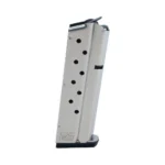 Ed Brown Handgun Magazine, angled side view of silver body with witness holes and black base