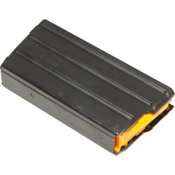 CMMG AR-15 Rifle Magazine, black angled side view with ribbed body and orange follower