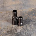 SilencerCo 3-Lug muzzle device, two black metal components shown upright