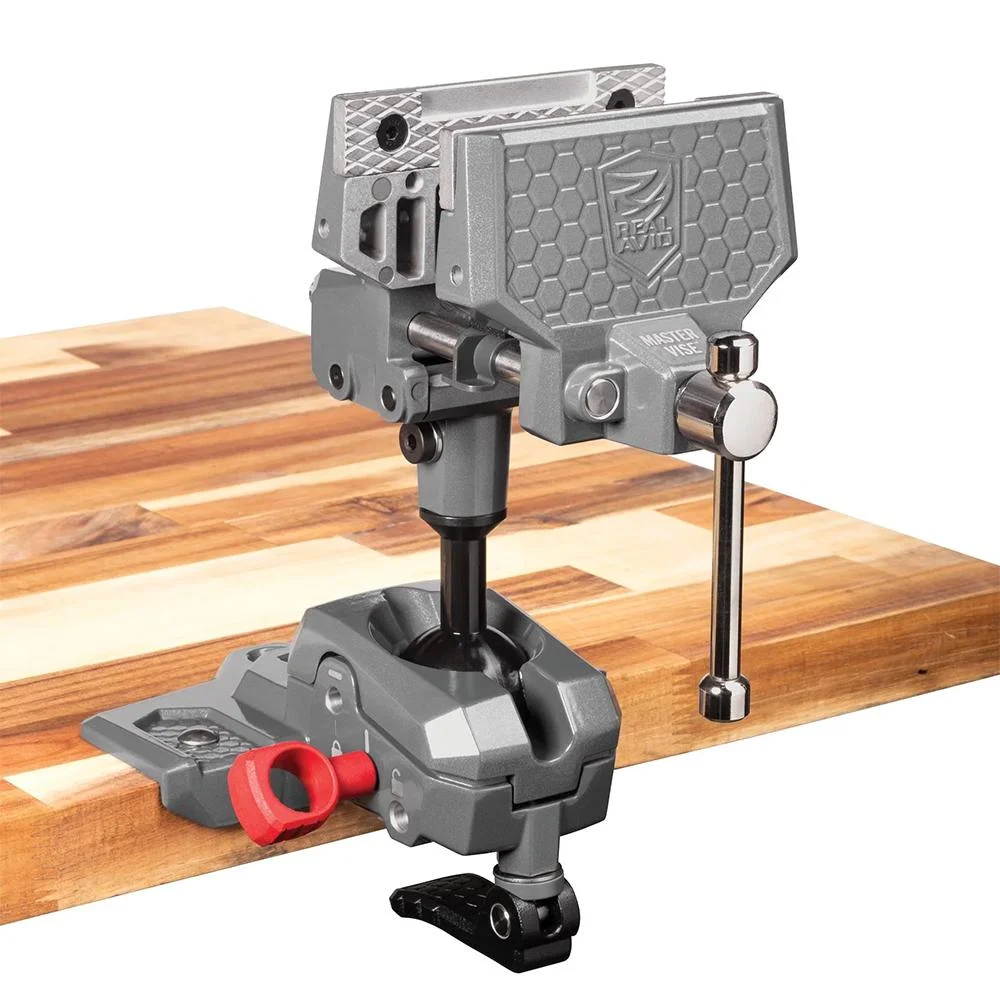 primary-55598 Real Avid Armorer's Master Vise gray bench-mounted vise, angled front view with handle and red knob