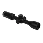 Riton 1 Primal, black riflescope in angled side view with adjustment turrets