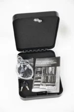 Snap Safe XX-Large Lockbox, open black lockbox with cable, keys and accessories inside
