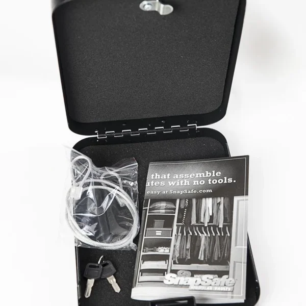 Snap Safe XX-Large Lockbox, open black lockbox with cable, keys and accessories inside