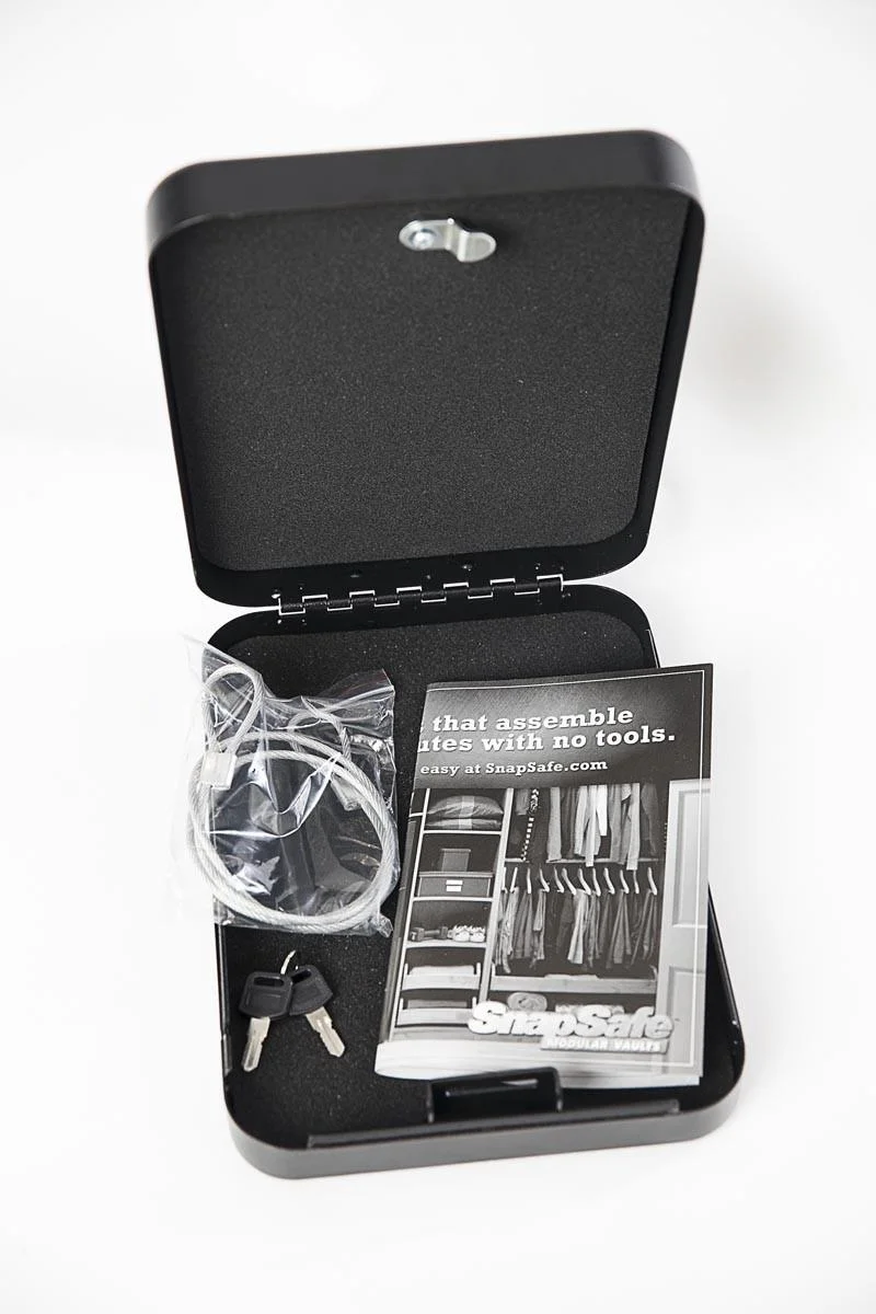 primary-55719 Snap Safe XX-Large Lockbox, open black lockbox with cable, keys and accessories inside