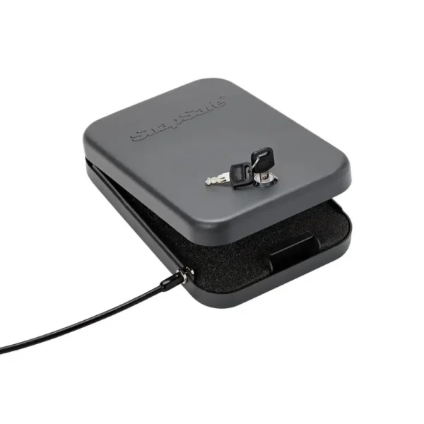 SnapSafe Large Lockbox Keyed, black, angled top view with open lid, foam lining, key and cable