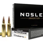 NOSLER RDG 22CM 85GR HPBT 20/200 black ammunition box with three brass cartridges, front view