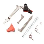 TIMNEY UBK FOR GLOCK GEN 5 silver, black and red trigger components with springs