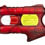 Kimber PepperBlaster III red, side view with white trigger, yellow label and textured grip