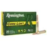 Remington REM 7MM REM MAG, green Core-Lokt box with two cartridges beside it