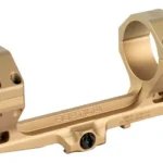 REPTILIA AUS 35MM MOUNT 1.54 FDE tan dual-ring mount, angled side view with clamp screws