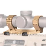 Reptilia AUS 1-Piece Scope Mount FDE side view mounted on a rifle with a silver scope