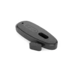 KICK-EEZ Special Slotted Recoil Pad, black angled view with elongated slot and textured face