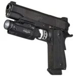 Streamlight TLR-10 Gun Light with Red Laser, black light mounted under a black pistol in side view