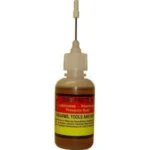 Pro-Shot Zero Friction amber liquid bottle with yellow label and needle applicator