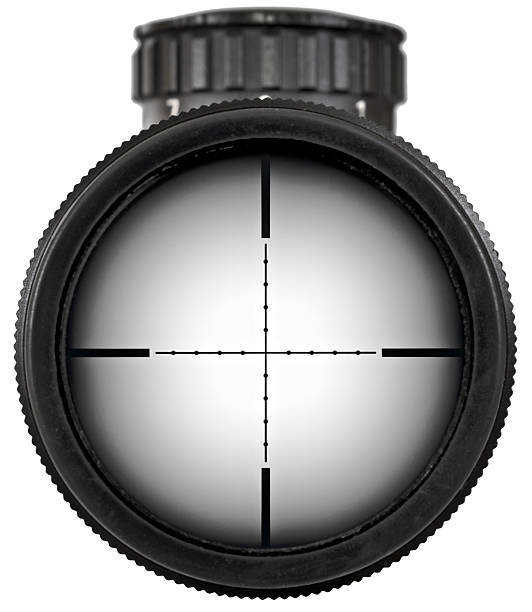 Rifle scope showing reticle, adjustment turrets, and objective lens