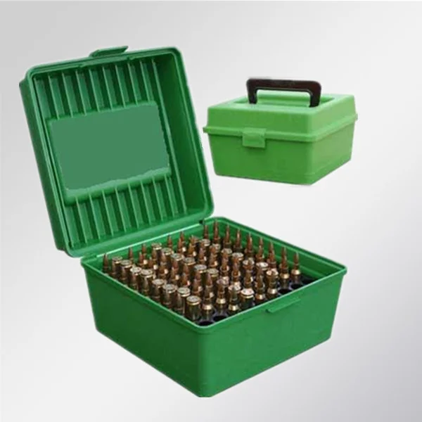 .308 Winchester ammunition boxes and cartridges beside a scoped hunting rifle