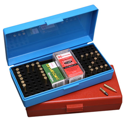 Assorted .22 LR ammunition boxes and rimfire cartridges on shooting bench